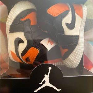 Orange Black And White Jordan 1s